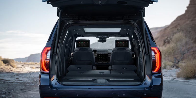 Rear view of the GMC Yukon XL with an open liftgate